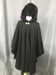 Cloak:3838, Cloak Style:Ruana Cape, Cloak Color:Black, Fiber / Weave:Rustic Large Yarn Visible Weave 100% wool Coating, Cloak Clasp:Triple Medallion, Hood Lining:Plum Purple Polyester Stretch Velvet, Back Length:42", Neck Length:26", Seasons:Southern Winter, Fall, Spring, Winter.