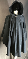 Cloak:3896, Cloak Style:Ruana - style cloak, Cloak Color:Dark Blue, Fiber / Weave:Windpro Fleece, Cloak Clasp:Vale, Hood Lining:self-lined fleece, Back Length:40", Neck Length:21", Seasons:Winter, Fall, Spring, Note:Warm and cuddly ruana is made from a<br>dusky dark blue Windpro fleece,<br>making it a perfect winter commuter cloak.<br>You won't believe how soft<br>the self-lined hood is!.