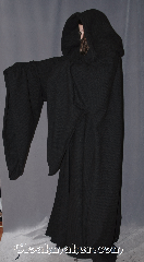Robe:R297, Robe Style:Emperor Palpatine style Robe, Robe Color:Black, Front/Collar:Hooded with Black cloth-covered hook and eye, Fiber:100% woven wool, Neck:26", Sleeve:40", Chest:72", Length:65", Height:Up to 6' 5". Can be shortened, Note:Join the dark side with<br>Emperor Palpatine's heavy<br>weight 100% wool with<br>cording in the extra large hood<br> and adjustable ruch<br>on the sleeves.<br>Dry clean only..